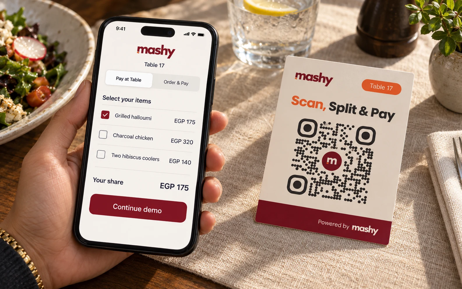 A guest selecting bill items on a phone beside a cream Mashy QR card.